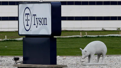 In this May 1, 2020 photo, a sign sits in front of the Tyson Foods plant in Waterloo, IA.