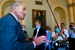 Senate Majority Leader Chuck Schumer, D-N.Y., updates reporters on the infrastructure negotiations between Republicans and Democrats, at the Capitol in Washington on July 28.