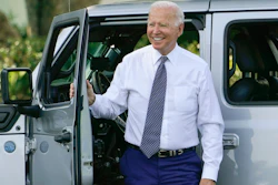 President Joe Biden smiles after driving a Jeep Wrangler 4xe Rubicon on the South Lawn of the White House, Aug. 5, 2021.
