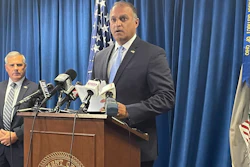 Acting U.S. Attorney Vipal J. Patel, center, accompanied by FBI Special Agent in Charge Chris Hoffman, speaks during a news conference in Cincinnati, Thursday, July 22, 2021. Federal authorities say Akron-based FirstEnergy Corp. would pay a $230 million penalty and fully cooperate as part of an agreement announced Thursday to settle federal charges against the company in a sweeping bribery scheme in Ohio.