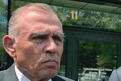 In this May 22, 2019, file photo, Ariel Quiros, left, former owner of Jay Peak Resort, stands outside the federal courthouse in Burlington, Vt., after his arraignment on fraud charges over a failed plan to build a biotechnology plant using foreign investors' money. The Miami businessman, accused of being the mastermind behind a massive fraud case involving foreign investors' money in Vermont developments, is expected to plead guilty in next week in a plea deal in which prosecutors are seeking a sentence of more than eight years in prison.