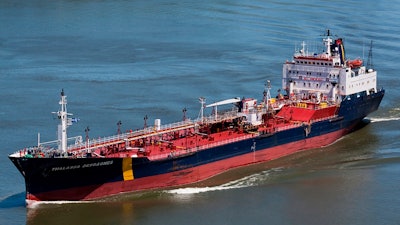 In this June 14, 2012 photo, the ship that would later become the Asphalt Princess sails through Quebec City, Canada. The hijackers who captured the Asphalt Princess off the coast of the United Arab Emirates in the Gulf of Oman departed the targeted ship on Wednesday, Aug. 4, 2021, the British navy reported, as recorded radio traffic appeared to reveal a crew member onboard saying Iranian gunmen had stormed the asphalt tanker.