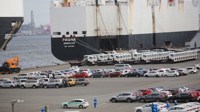 In this Sept. 29, 2020, file photo, cars wait to be exported at Yokohama port, near Tokyo. Japan's exports in July jumped 37% from a year ago, the government said Wednesday, Aug. 18, 2021, highlighting an overseas recovery from the coronavirus pandemic.