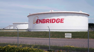 This June 29, 2018 file photo shows tanks at the Enbridge Energy terminal in Superior, Wis. Wednesday is the deadline for tribal and environmental groups opposed to Enbridge Energy's Line 3 oil pipeline project to ask the Minnesota Supreme Court to overturn a lower court decision affirming the approvals granted by independent regulators that allowed construction to begin last December.