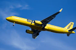 A Spirit Airlines jet approaches Philadelphia International Airport in Philadelphia, Wednesday, Feb. 24, 2021. On Monday, Aug. 16, 2021, Spirit said the cancellation of more than 2,800 flights over an 11-day stretch this summer cost the budget airline about $50 million in lost revenue and caused spending to soar.