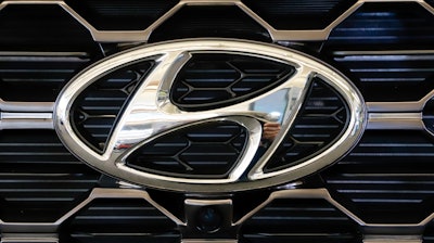 Hyundai logo on a 2019 Santa Fe SUV at the Pittsburgh International Auto Show, Feb. 14, 2019.