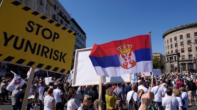 People attend a protest against pollution and the exploitation of a lithium mine, Belgrade, Serbia, Sept. 11, 2021.