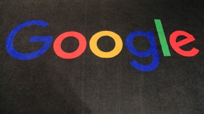 Google logo displayed on a carpet at the entrance hall of Google France in Paris, Nov. 18, 2019.