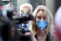 Elizabeth Holmes, founder and CEO of Theranos, arrives at the federal courthouse for jury selection in her trial, San Jose, Calif., Aug. 31, 2021.