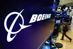 The logo for Boeing appears on a screen above a trading post on the floor of the New York Stock Exchange, Tuesday, July 13, 2021. Despite the pandemic's damage to air travel, Boeing says it's optimistic about long-term demand for airplanes. Boeing said Tuesday, Sept. 14, 2021 that it expects the aerospace market to be worth $9 trillion over the next decade. That includes planes for airlines and military uses and other aerospace products and services.