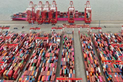 In this July 10, 2021, file photo, the Yangshan container port is seen in an aerial view in Shanghai, China. China has applied to join an 11-nation Asia-Pacific free trade group in an effort to increase its influence over international policies.