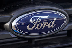 This April 25, 2021 photo shows the blue oval logo of Ford Motor Company in east Denver. Ford say, Thursday, Sept. 9, it’s going to stop making vehicles for sale in India immediately as part of its efforts to return its business there to profitability, resulting in the loss of approximately 4,000 jobs.