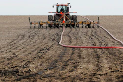 Injecting manure into a field as fertilizer in Lawler, Iowa. Manure management is a major source of greenhouse gas emissions from livestock.