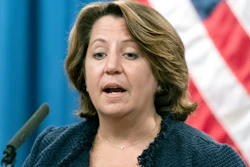 In this Sept. 30, 2021 photo, Deputy Attorney General Lisa Monaco speaks with reporters during a news conference at the Department of Justice in Washington. Monaco said the Justice Department, as part of a new initiative, is prepared to take legal action under a statute called the False Claims Act against contractors who misuse federal dollars by failing to disclose hacks or by having deficient cybersecurity standards. The department will also protect whistleblowers who come forward to report those issues.