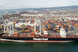 The Rotterdam Express is seen at the Port of Oakland, Wednesday, Oct. 6, 2021 in Oakland, Calif. The Rotterdam Express, a massive cargo ship made a series of unusual movements while anchored in the closest spot to a Southern California oil pipeline that ruptured and sent crude washing up on beaches, according to data collected by a marine navigation service.
