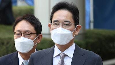 Samsung Electronics Vice Chairman Lee Jae-yong leaves the Seoul Central District Court in Seoul, Oct. 26, 2021.