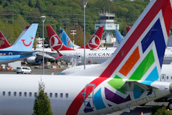 In this April 26, 2021, file photo Boeing 737 Max airplanes sit parked in a storage lot, near Boeing Field in Seattle. The Boeing Co. told employees, Tuesday, Oct. 12, 2021, that they must be vaccinated against COVID-19 or possibly be fired.