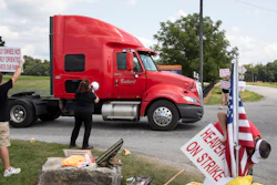 Bettye Jo Boone, a 30 year employee of Heaven Hill, pickets in front of Heaven Hill Distillery in Bardstown, Ky., Monday, Sept. 13, 2021. Declaring an impasse in contract talks with striking union workers, global spirits producer Heaven Hill said Monday, Oct. 18 it will start hiring permanent replacement workers for bottling and warehouse operations in Kentucky.
