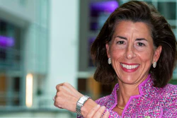 In this Tuesday, Sept. 28, 2021, photo Commerce Secretary Gina Raimondo poses for a photograph with her Bulova watch. Raimondo only wears watches made by Bulova — a company that fired her scientist father, closed its Rhode Island factory and moved production to China in 1983. “It’s been a tribute to my dad,' Raimondo said in an interview, “and a reminder to me that we need to do more to get good manufacturing jobs in America.”