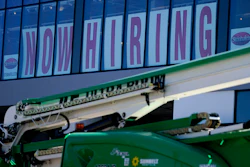 A hiring sign is displayed at a furniture store window on Friday, Sept. 17, 2021, in Downers Grove, Ill. Unemployment claims dropped 6,000 to 290,000 last week, the third straight drop, the Labor Department said Thursday, Oct. 21, 2021.