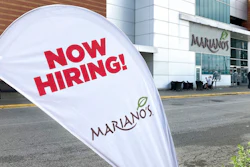 A sign in the parking lot of Mariano's grocery store advertises the availability of jobs Friday, Oct. 8, 2021, in Chicago. One reason America’s employers are having trouble filling jobs was starkly illustrated in a report Tuesday, Oct. 12: Americans are quitting in droves.