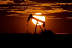 In this Wednesday, April 8, 2020 file photo, the sun sets behind an idle pump jack near Karnes City, USA. The OPEC oil cartel and allied countries are meeting to decide on production. The meeting is being closely watched because oil markets are tight and the price of crude is just off a three-year high as the global economy bounces back from the pandemic.