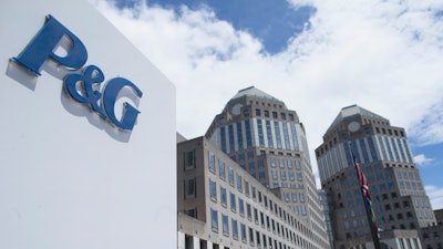 In this Thursday, July 9, 2015, file photo, the Proctor & Gamble headquarters complex is seen in downtown Cincinnati. Proctor & Gamble is raising prices on a range of goods as higher commodity and freight costs are set to take a bite out of its profits.