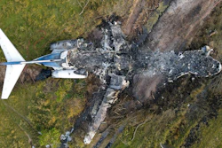 The remnants of an aircraft, which caught fire soon after a failed take-off attempt at Houston Executive Airport, are seen just north of Morton Road on Tuesday, Oct. 19, 2021, in Brookshire. Texas.