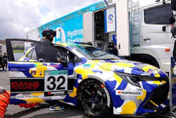 This photo released by Toyota Motor Corp., shows a hydrogen engine car being refueled during the five-hour-long Super Taikyu Race at Autopolis in Hita, Oita prefecture, southern Japan on July 31, 2021. Toyota said Monday, Oct. 25, 2021 it is testing hydrogen combustion engines in race cars as it works toward using the technology in commercial products.