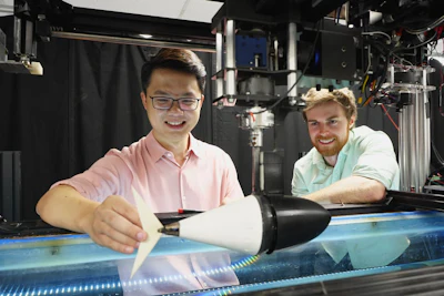 Qiang Zhong (left) and Daniel Quinn designed their robot to vary its stiffness as it swam at different speeds.