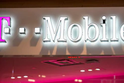 T-Mobile sign at a shopping mall, Pittsburgh, Feb. 24, 2021.