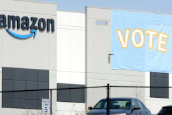 In this March 30 photo, a banner encouraging workers to vote in labor balloting is shown at an Amazon warehouse in Bessemer, Ala.