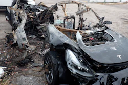 Damage to a 2021 Tesla Model 3 Long Range Dual Motor following a crash in Coral Gables, Fla., Sept. 2021.