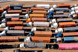 Trucks line up to enter a Port of Oakland shipping terminal on Nov. 10, 2021, in Oakland, CA.