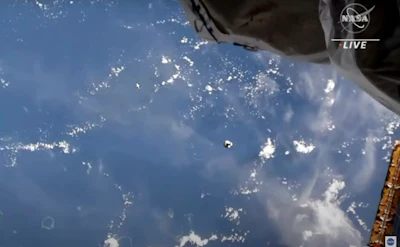 This image from video provided by NASA shows the SpaceX Dragon approaching the International Space Station, Thursday, Nov. 11, 2021. A SpaceX capsule carrying four astronauts pulled up Thursday at the International Space Station, their new home until spring. It took 21 hours for the flight from NASA’s Kennedy Space Center to the glittering outpost.