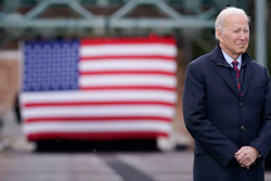 President Joe Biden waits to speak during a visit to the NH 175 bridge over the Pemigewasset River to promote infrastructure spending Tuesday, Nov. 16, 2021, in Woodstock, N.H.