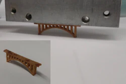 A novel polymer developed at Oak Ridge National Laboratory strengthens sand for additive manufacturing applications. A 6.5 centimeter 3D-printed sand bridge, shown here, held 300 times its own weight.