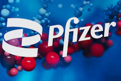 The Pfizer logo is displayed at the company's headquarters in New York, on Feb. 5, 2021. In a statement on Tuesday, Nov. 16, 2021, drugmaker Pfizer Inc. said it has signed a deal with a U.N.-backed group to allow other manufacturers to make its experimental coronavirus pill, in a move that could make its treatment available to more than half of the world’s population.