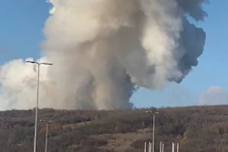 Smoke billows following a blast in the outskirts of Belgrade, Serbia, Tuesday, Nov. 22, 2021. Serbia’s state RTS television has reported that a series of explosions ripped through an munitions factory on the outskirts of Belgrade, killing at least 2 workers and injuring at least 16.