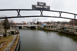 This Jan. 26, 2016, file photo, shows the Flint River in Flint, Mich. A judge on Wednesday, Nov. 10, 2021, approved a $626 million settlement for Flint residents and others who were exposed to lead-contaminated water.