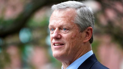 Massachusetts Gov. Charlie Baker speaks during a Juneteenth commemoration in Boston's Nubian Square on June 18, 2021. Baker is abandoning his administration's ambitious plan to create a multi-state compact aimed at dramatically reducing transportation pollution after the deal failed to gain traction in other states. The announcement comes after Democratic Connecticut Gov. Ned Lamont, who supported the initiative, indicated this week he was backing away from the Transportation and Climate Initiative.