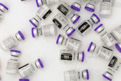 Vials of the Pfizer-BioNTech COVID-19 vaccine sit in a cooler before being thawed at a pop-up COVID-19 vaccination site in the Bronx borough of New York on Tuesday, Jan. 26, 2021. On Tuesday, Nov. 9, 2021, Pfizer asked U.S. regulators to allow boosters of its COVID-19 vaccine for anyone 18 or older.