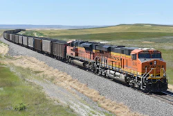 A BNSF railroad train hauling carloads of coal from the Powder River Basin of Montana and Wyoming is seen east of Hardin, Mont., on July 15, 2020. BNSF Railway has gone to court to determine whether it has the authority to require all its employees to get vaccinated against the coronavirus.