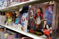 A doll based on the upcoming Walt Disney Studios film 'Mulan' is displayed in the toy section of a Target department store, April 30, 2020, in Glendale, Calif. As supply chain bottlenecks create shortages on many items, some charities are struggling to secure holiday gift wishes from kids in need.