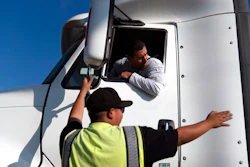 Senior instructor Markus Juarez, bottom, talks to student driver Jaime Rojas at California Truck Driving Academy in Inglewood, Calif., Wednesday, Nov. 17, 2021. Amid a shortage of commercial truck drivers across the U.S., a Southern California truck driving school sees an unprecedented increase in enrollment numbers. The increase is big enough that the school is starting an evening class to meet the demand, according to Tina Singh, owner and academy director of California Truck Driving Academy. 'I think that's only going to continue because there's a lot of job opportunities. We have over 100 active jobs on our job board right now,' said Singh. The companies that normally would not hire drivers straight out of school are '100 percent' willing to hire them due to shortage issues, the director added.