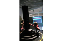 Two girls operate the Giant Joystick at LABoral Art and Industrial Creation Centre, March 31, 2007 in Asturias, Spain.