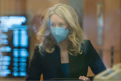Elizabeth Holmes walks into federal court in San Jose, Calif., Nov. 22, 2021.