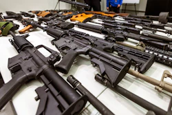 A variety of military-style semi-automatic rifles obtained during a buy back program displayed at Los Angeles police headquarters, Dec. 27, 2012.