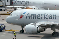 American Airlines passenger jets prepare for departure at Boston Logan International Airport, July 21, 2021.