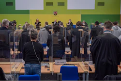 Presiding judge G'nther Koehler announces the verdicts in the so-called Cyberbunker trial at the regional court in Trier, Germany, Dec. 13, 2021.